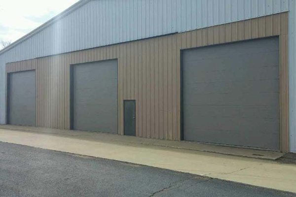 You are currently viewing What Causes Commercial Garage Doors to Malfunction | Commercial Garage Door Service Near Me